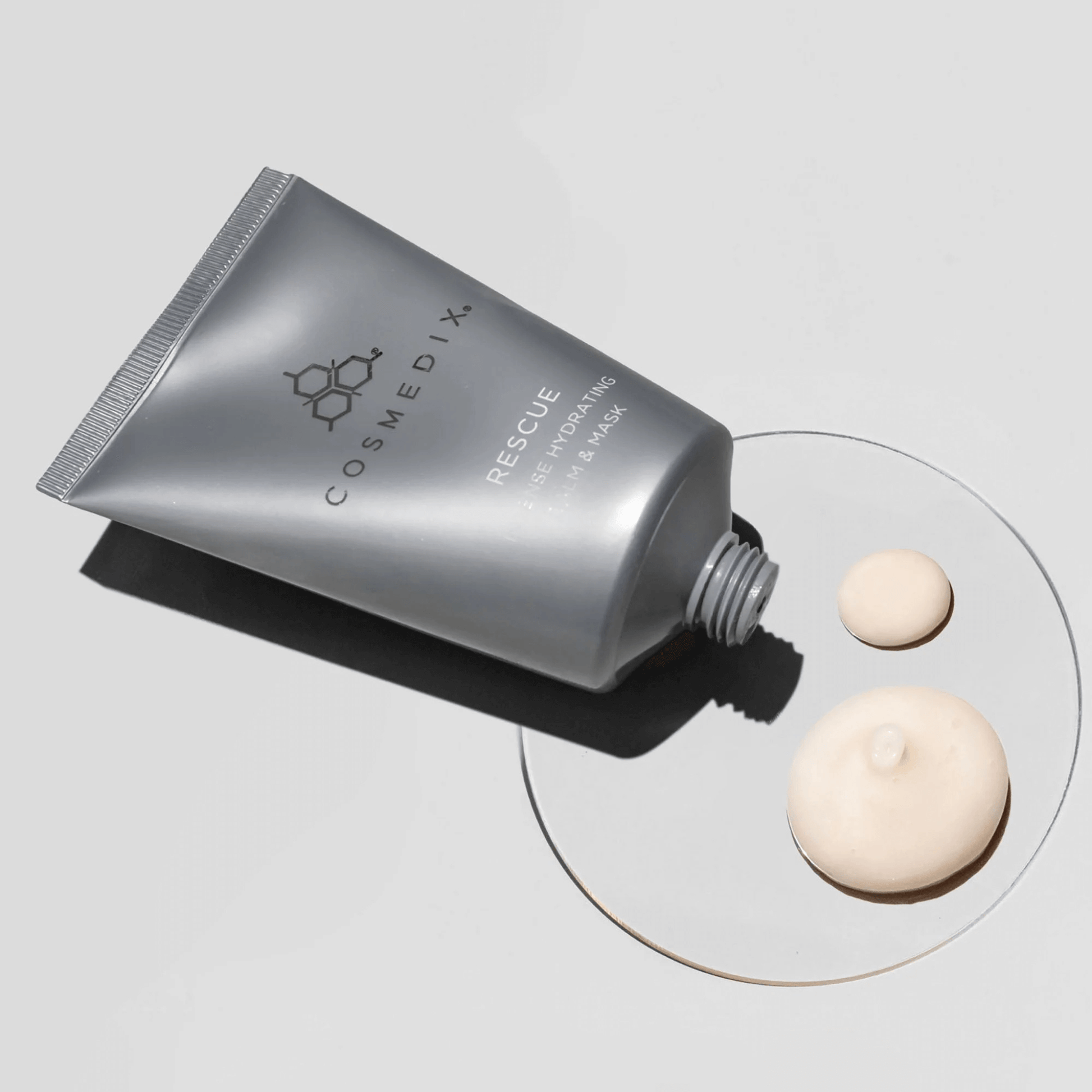 Cosmedix Rescue Moisturiser skincare product on a grey background