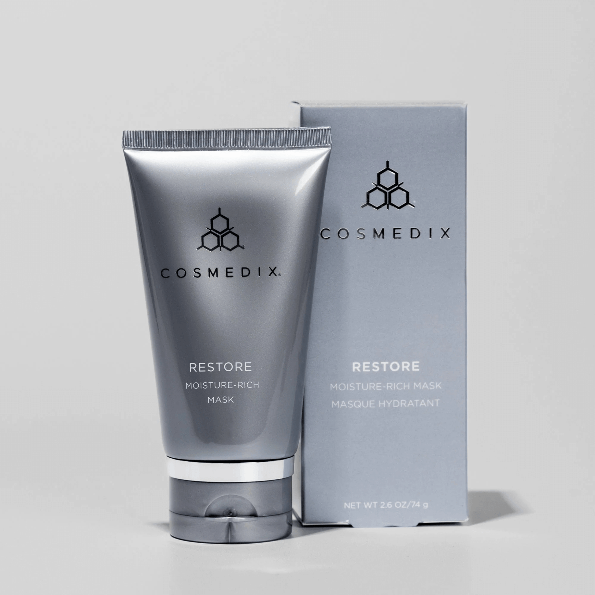 Cosmedix Restore Moisture-Rich Mask with packaging on a light grey background