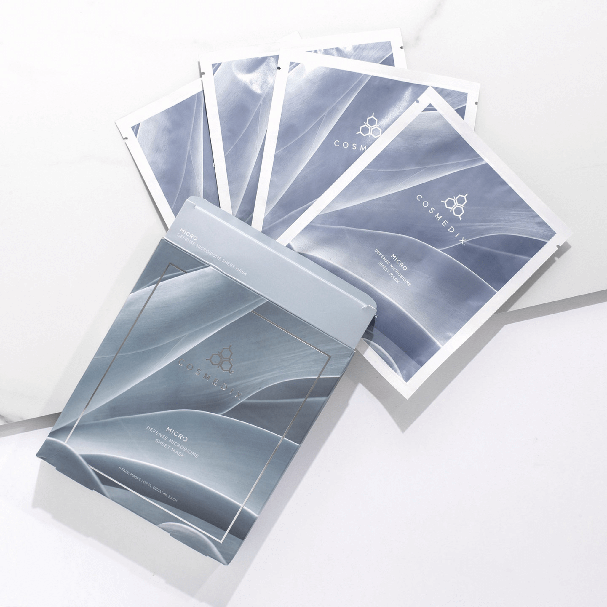 Cosmedix skincare masks on a white background