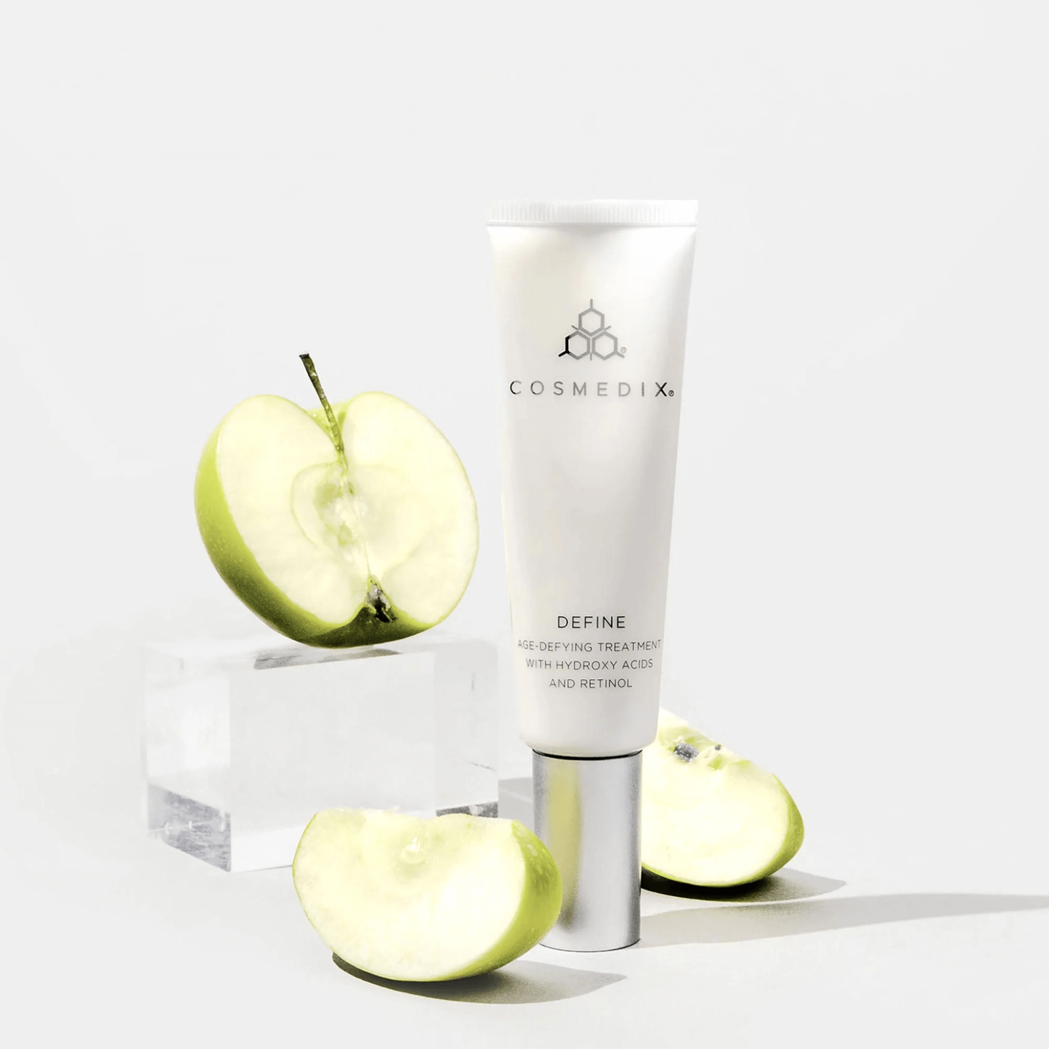 Cosmedix Define age defying treatment with apples on a white background