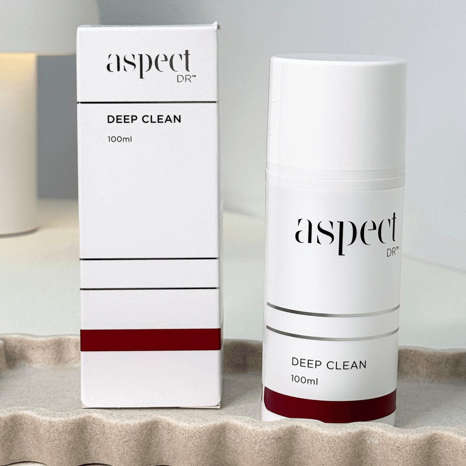 Deep Clean Aspect Dr container and packaging on white background