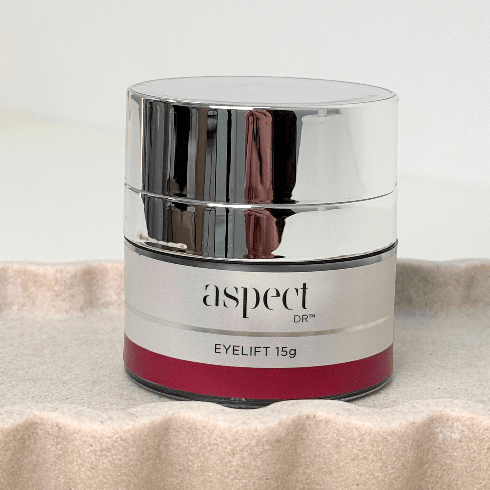 Eyelift Cream Aspect Dr 15g jar on neutral background