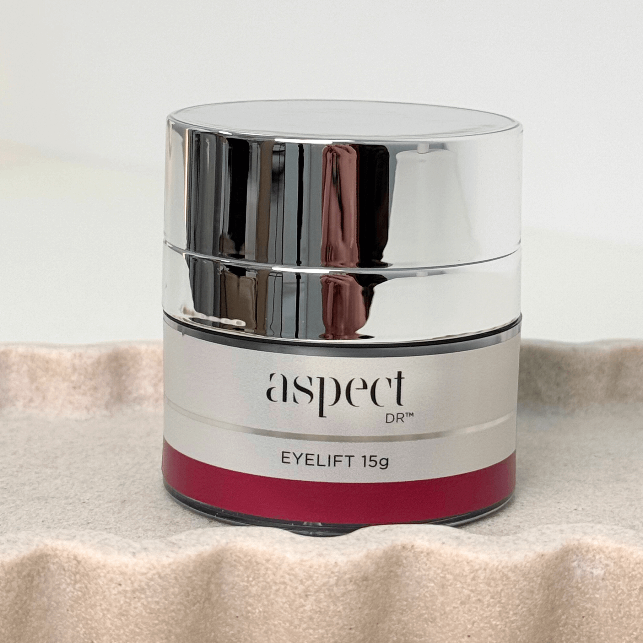 Eyelift Cream Aspect Dr 15g jar on neutral background