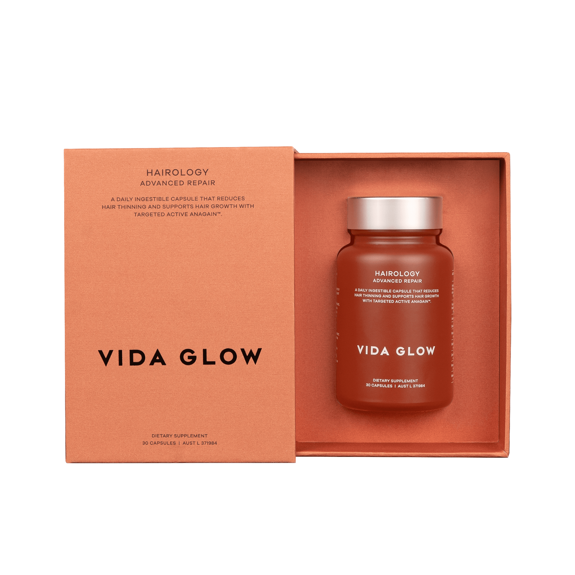 Vida Glow hair supplement jar with packaging on a white background
