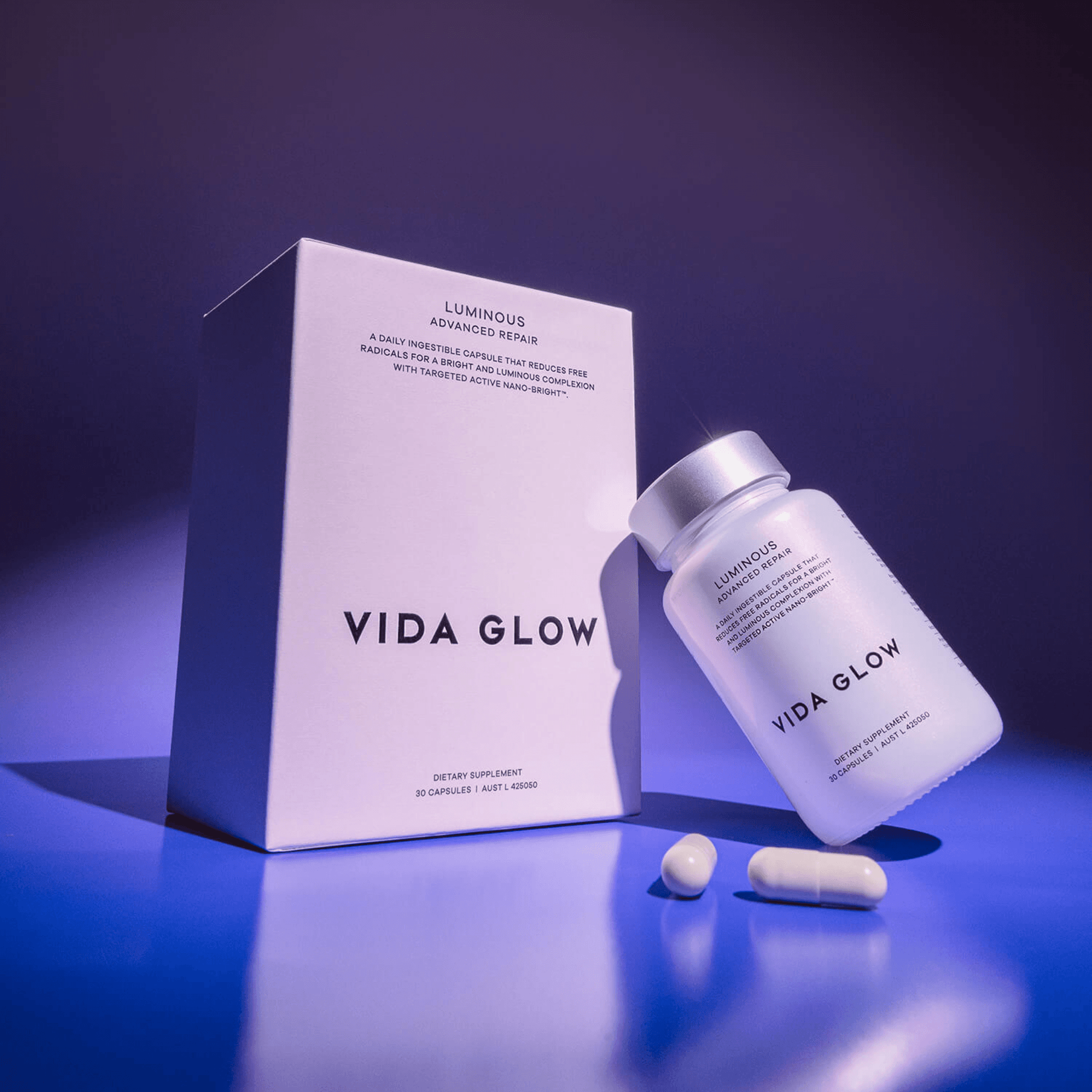 Vida Glow Luminous Box and packaging on purple background