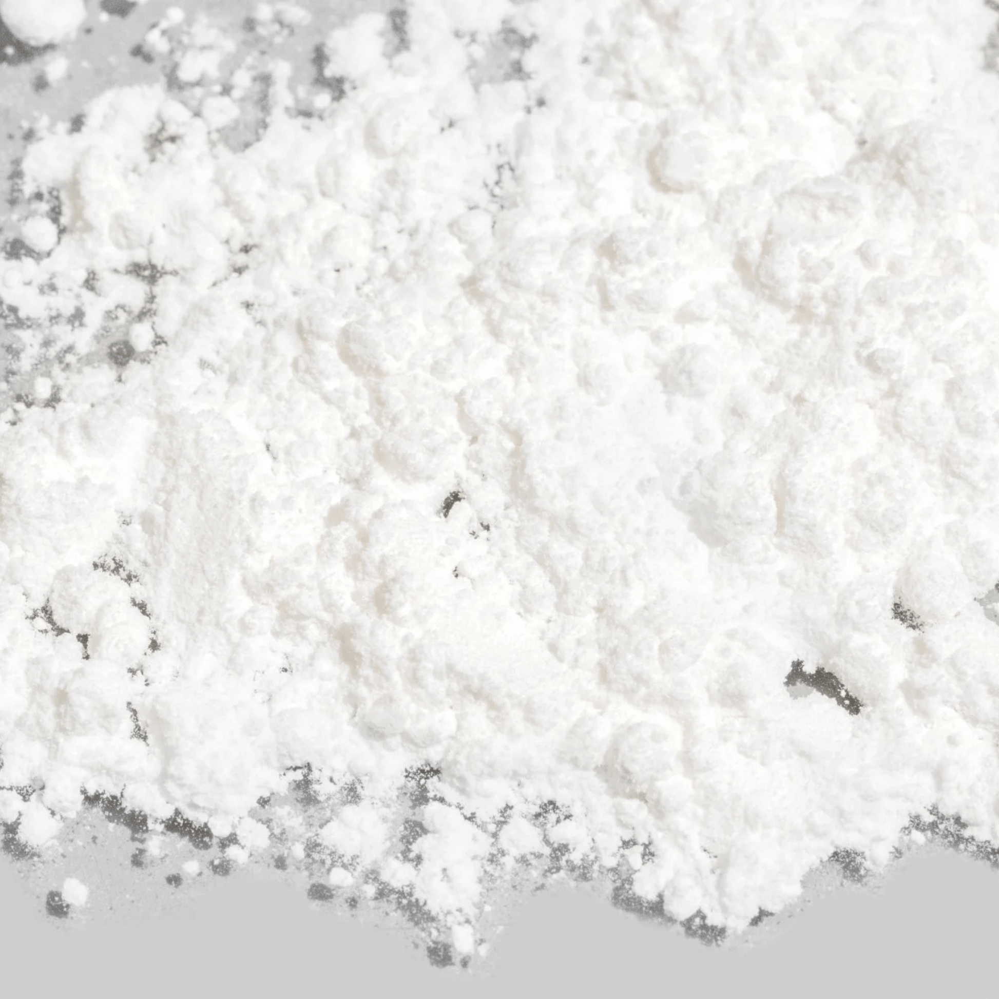 Close-up of Cosmedix Pure C Vitamin C on a grey background