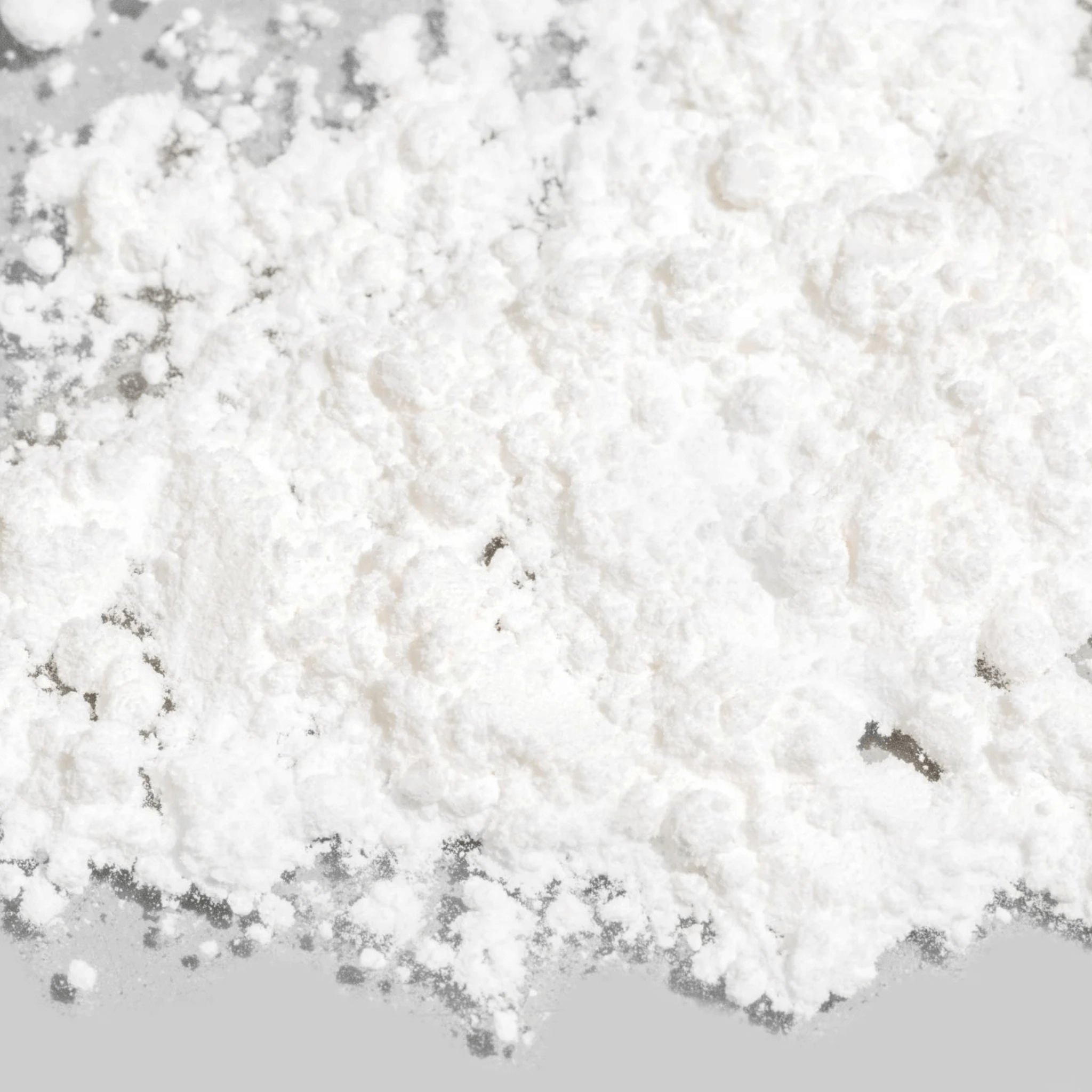 Close-up of Cosmedix Pure C Vitamin C on a grey background