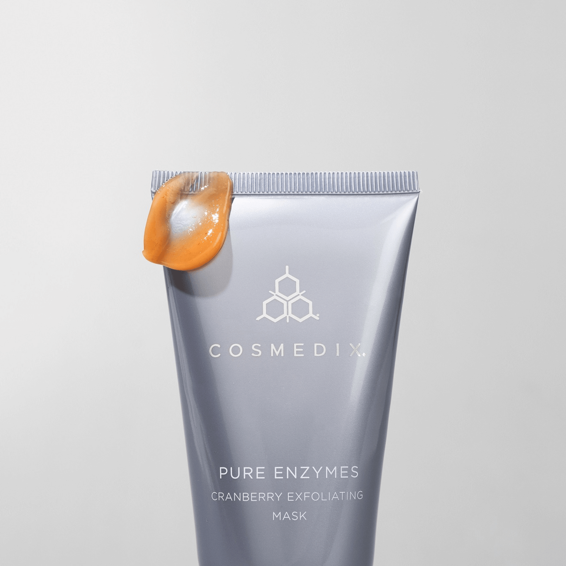 Cosmedix Pure Enzymes Cranberry Exfoliating Mask on a light grey background