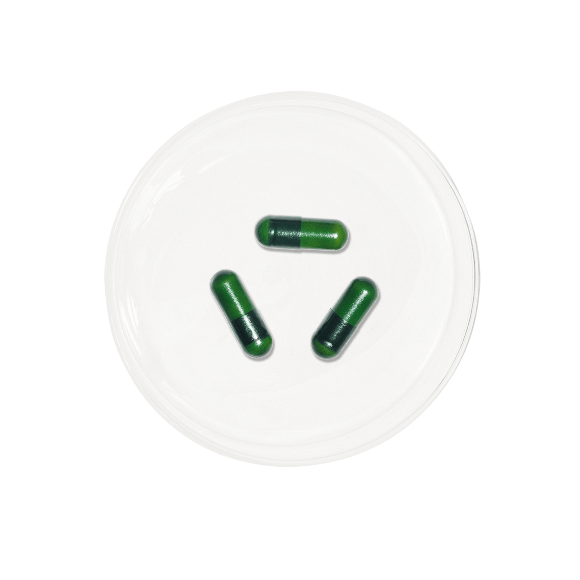Three green radiance plus capsules in a petri dish on a white plate