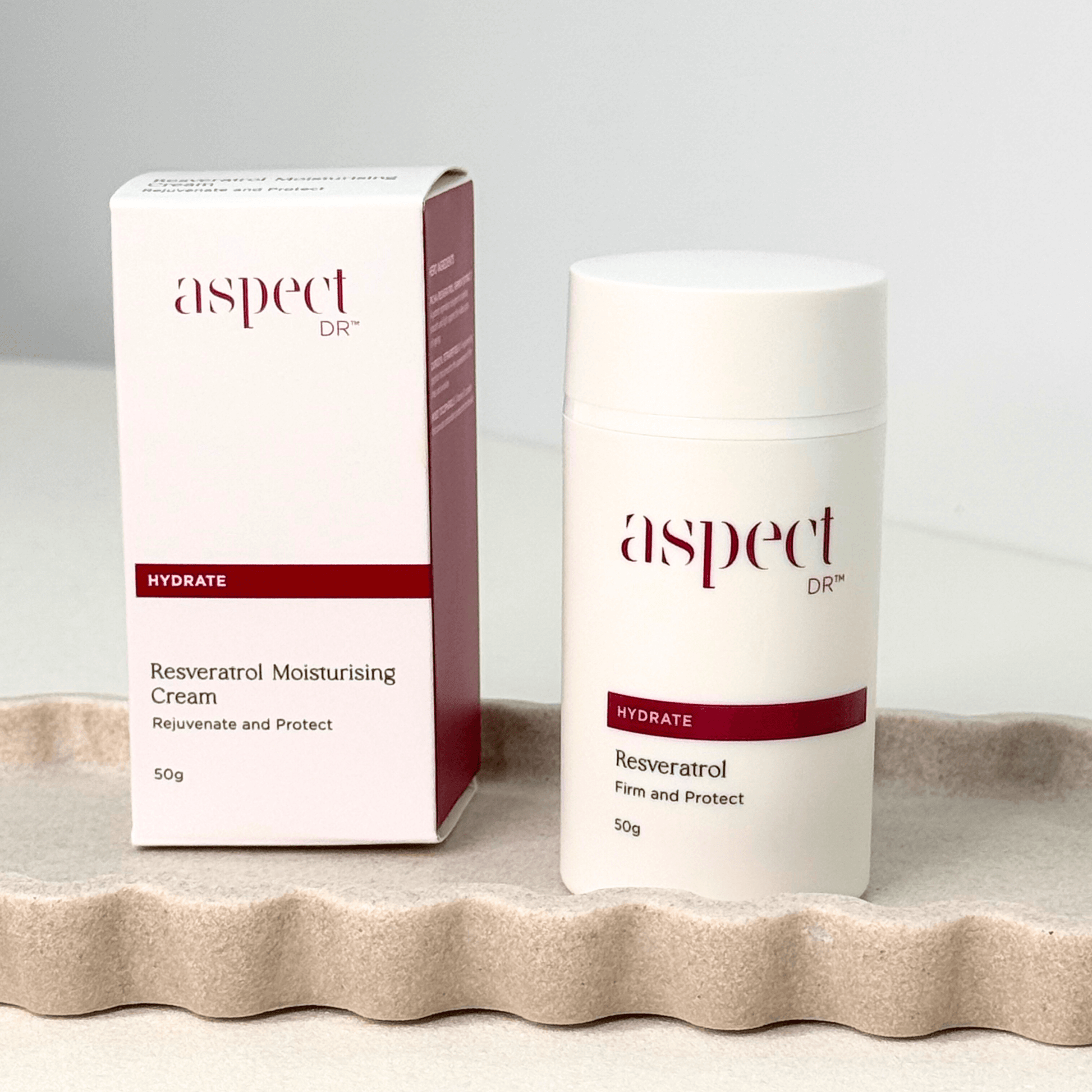 Resveratrol Aspect Dr container and box on neutral background