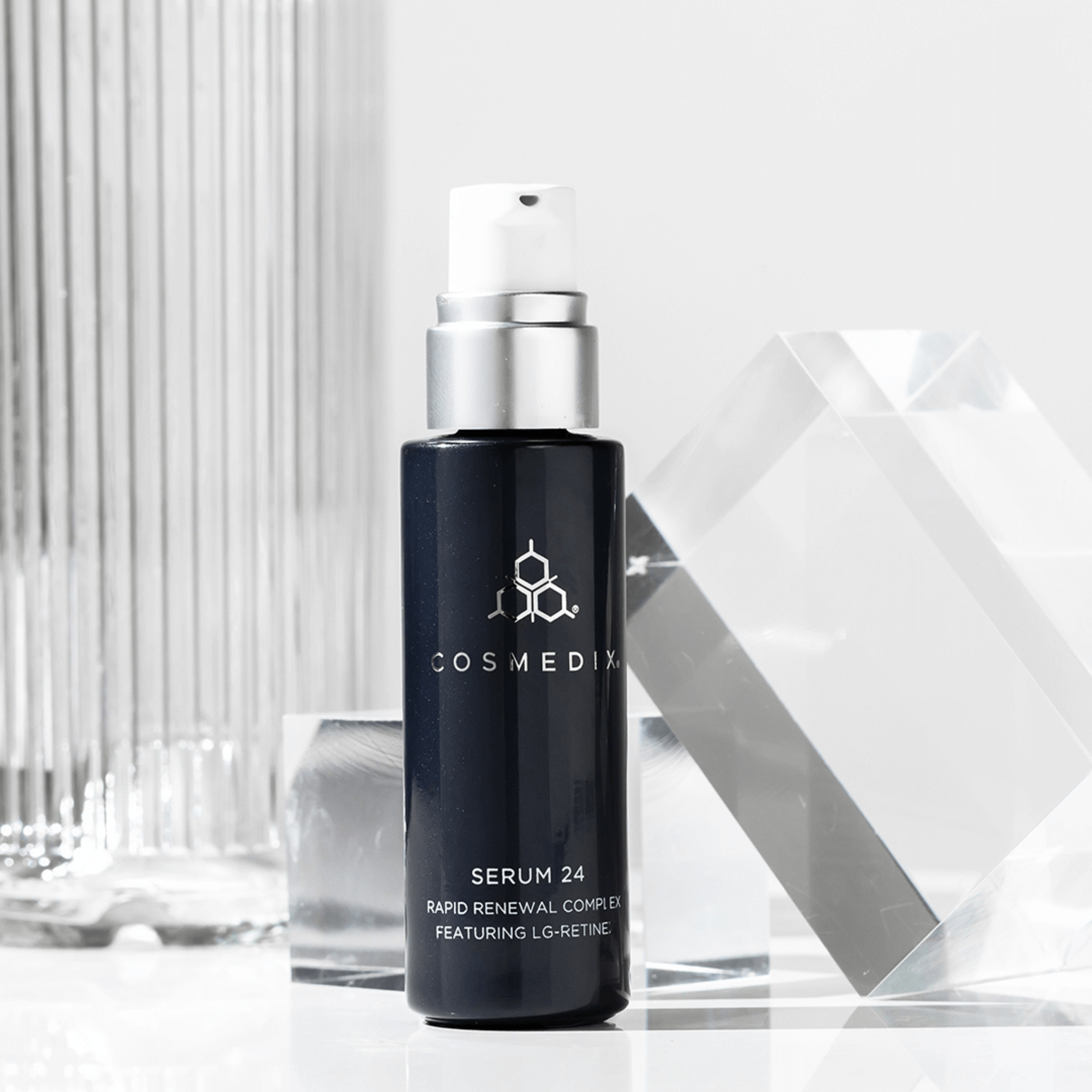 Cosmedix Elite Serum 24 bottle on white clinical background