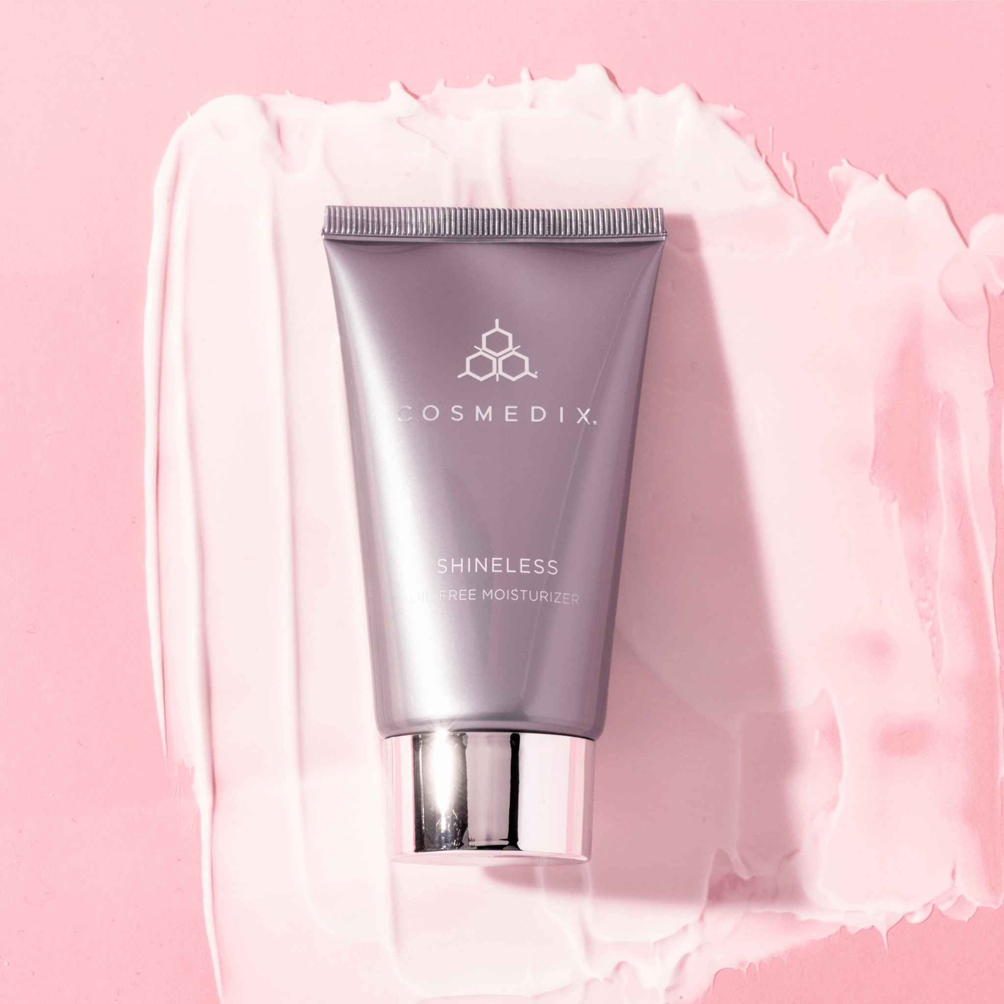 Cosmedix Shineless moisturiser on pink background