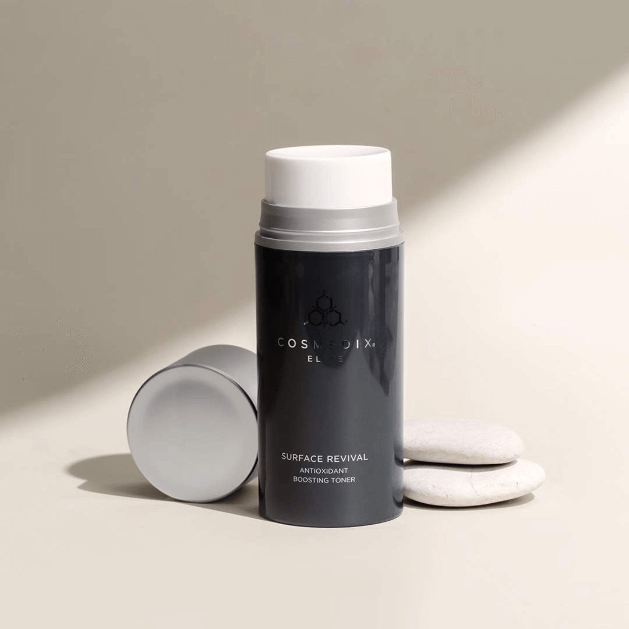 Cosmedix Elite Surface revival toner product on a neutral background