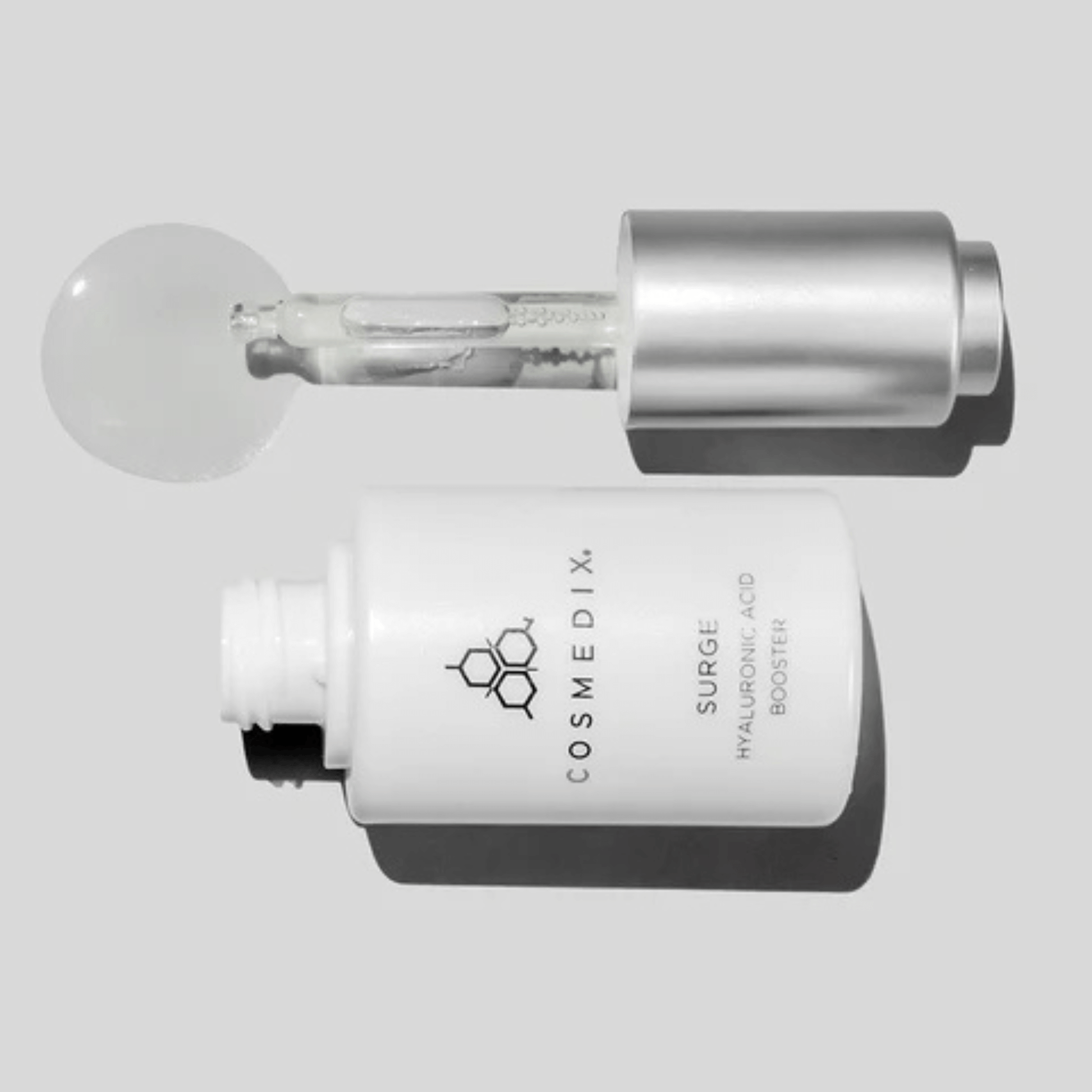 Cosmedix Surge Hyaluronic Acid booster on a light grey background