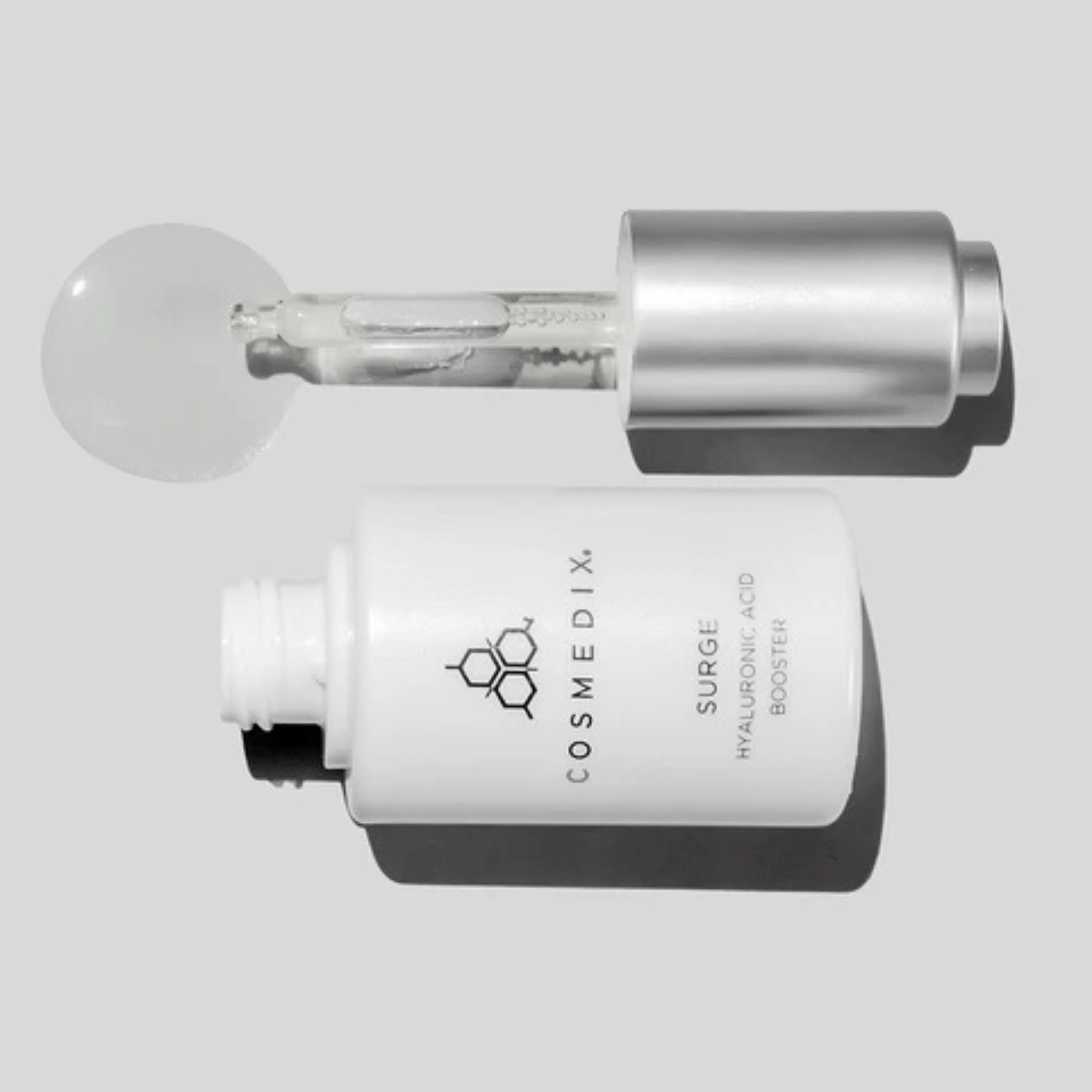 Cosmedix Surge Hyaluronic Acid booster on a light grey background