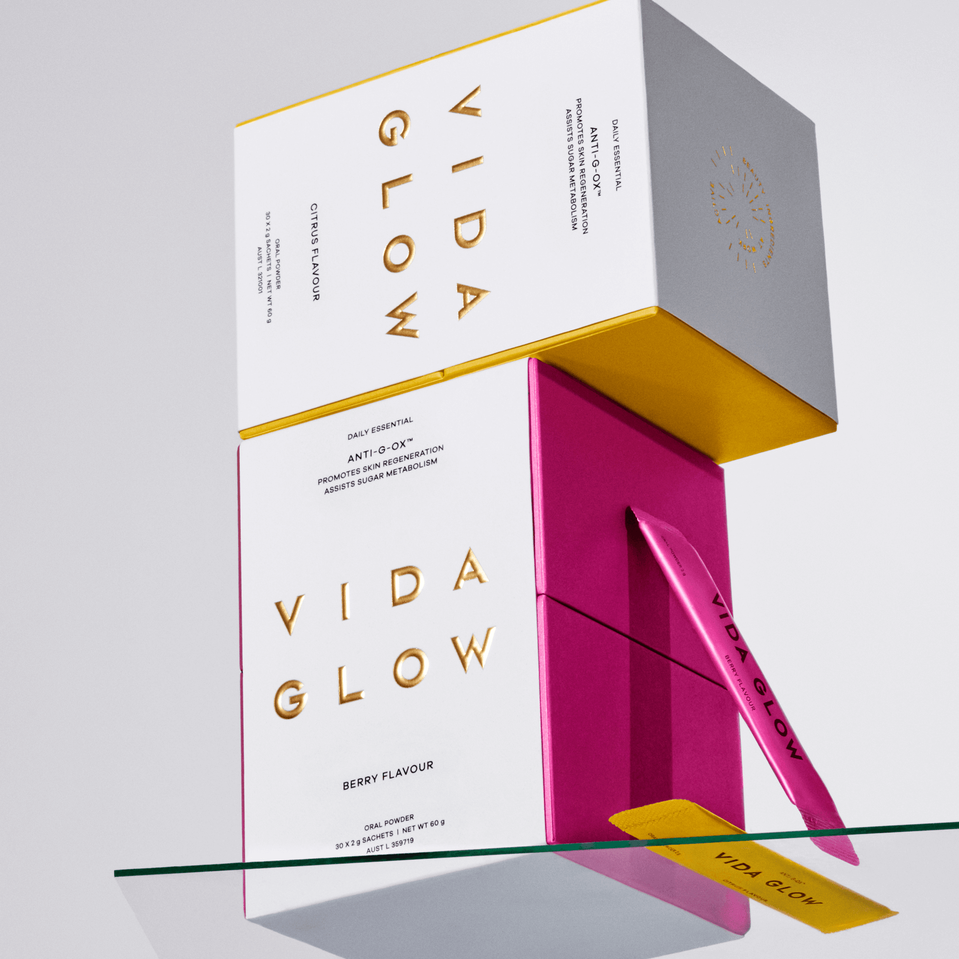Vida glow anti-g-ox berry flavour and citrus flavour stacked boxes on white background