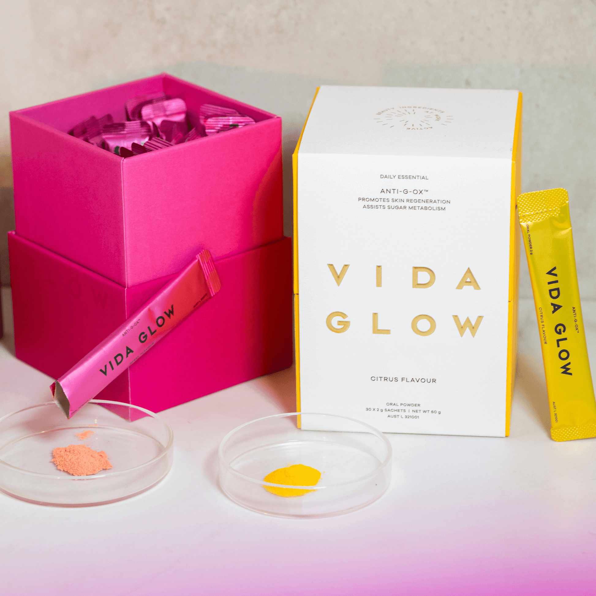 Vida glow anti-g-ox dual flavour packs citrus and berry flavour with sachets and petri dishes of collagen powder