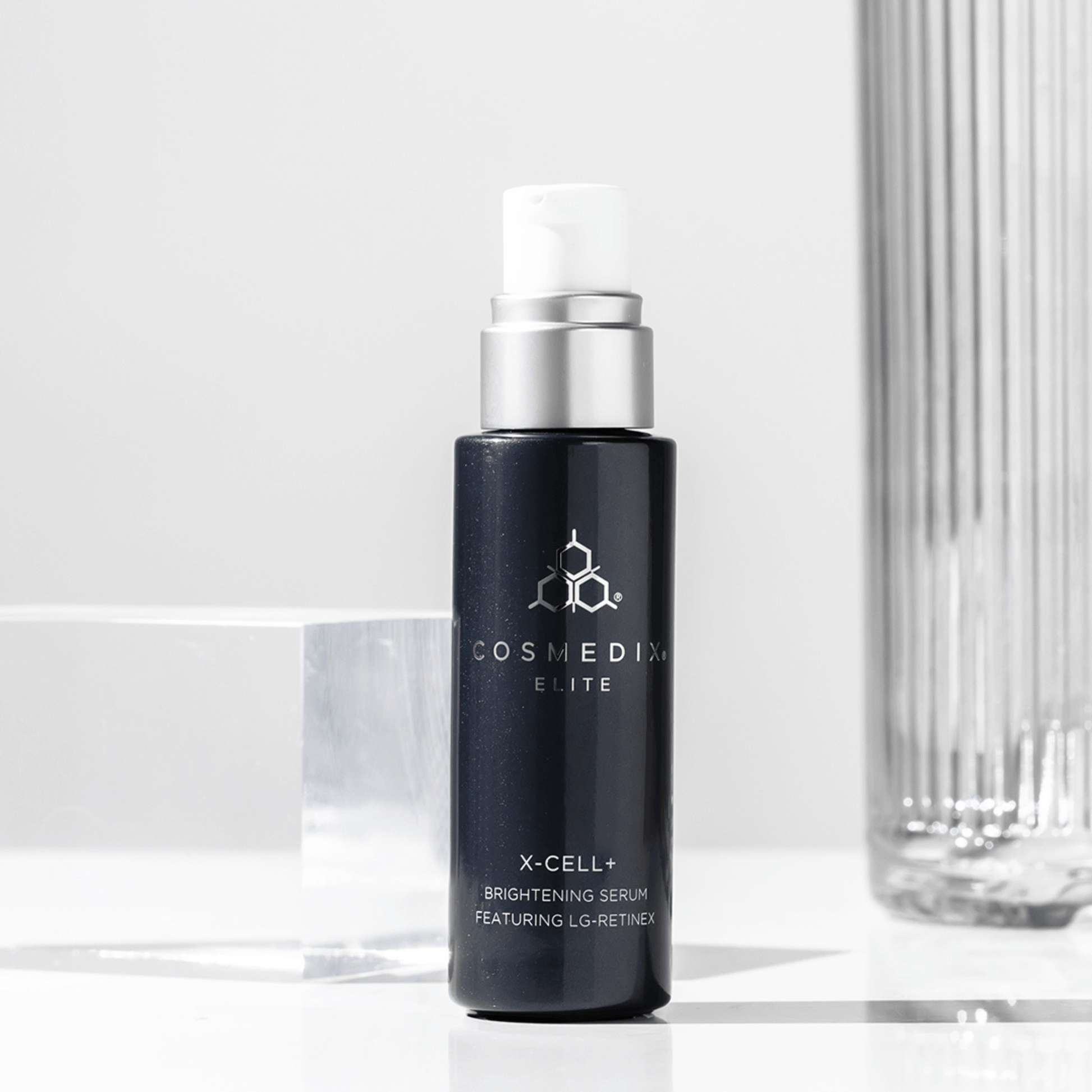 Cosmedix X-cell+ Brightening Serum skincare serum bottle on a light background